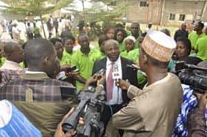 Picture of IITA Director General Sanginga creating media interest explaining the agripreneurs scheme.