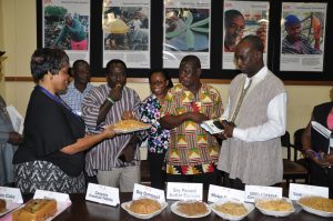 Picture of IITA Crop Utilization Specialist, Bussie Maxiya-Dixon entertaining guests with recipes made from IITA m andate crops