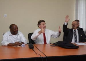 Picture of H.E Ambassador Symington (center) gives thumbs up sign to IITA to the excitement of DG Sanginga (left) and DDG Dashiell (right).