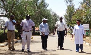 PIcture of DG accompanied by IITA and KALRO Katumani staff as he tours the center.