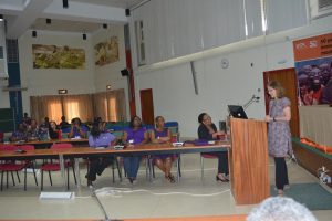 Picture of DDG, Corporate Services, Hilde Koper-Limbourg, speaking to the audience at the IWD celebration
