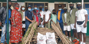 Presenting cassava stems and maize seeds to Osun orientation camp.