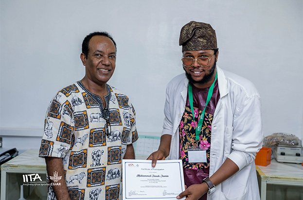 University of Ibadan Masters' student, Muhammed Jimoh, received his certificate at the end of the training.