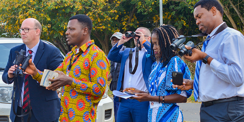 IITA Forest Center Field Supervisor, Ademola Ajayi, leading the team to enjoy nature through bird-watching.
