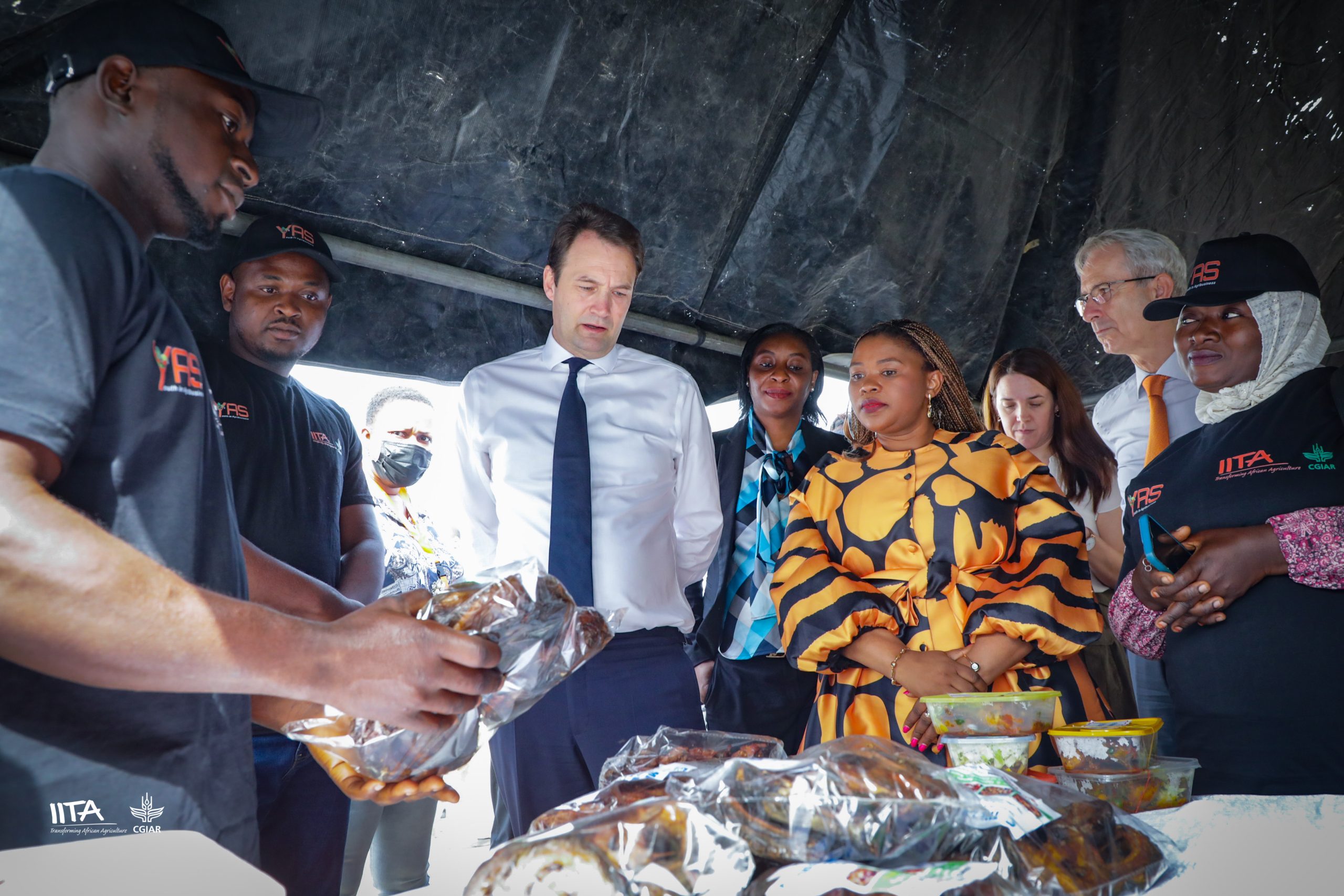 A 2023 beneficiary of YAS training exhibiting some of his products