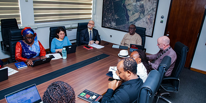 IITA Director General Dr Simeon Ehui with some members of the IITA Management and researchers during discussions with the NFWP team.