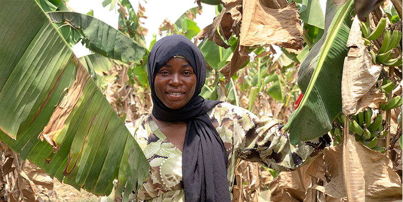 Azeezat on the banana farm.