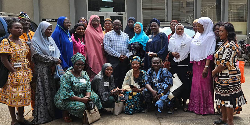 Dr Olaniyi Oyatomi IITA-GRC Seed Manager and SUL Linkage Officer with the NAWAI visiting team.