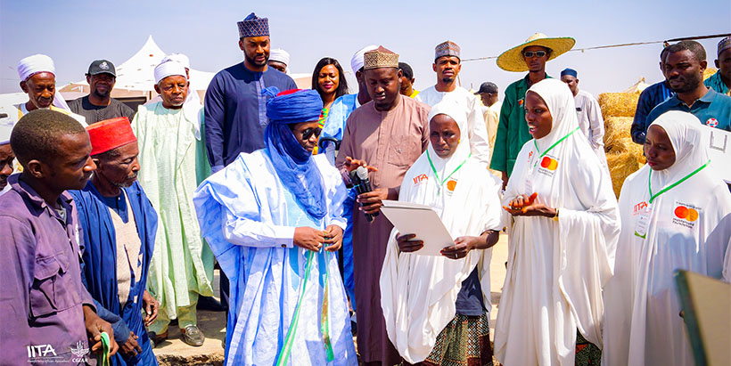 A women’s cooperative group receiving their certificate of registration and input from Mr. Ardo Bamanga Dalil, District Head of Mayo-Belwa, Adamawa State.