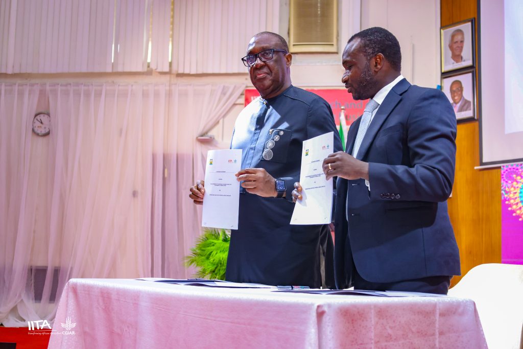 IITA Director General, Dr Simeon Ehui and Sierra Leone Minister of Agriculture and Food Security Dr Henry Musa Kpaka with the signed Memorandum of Understanding.