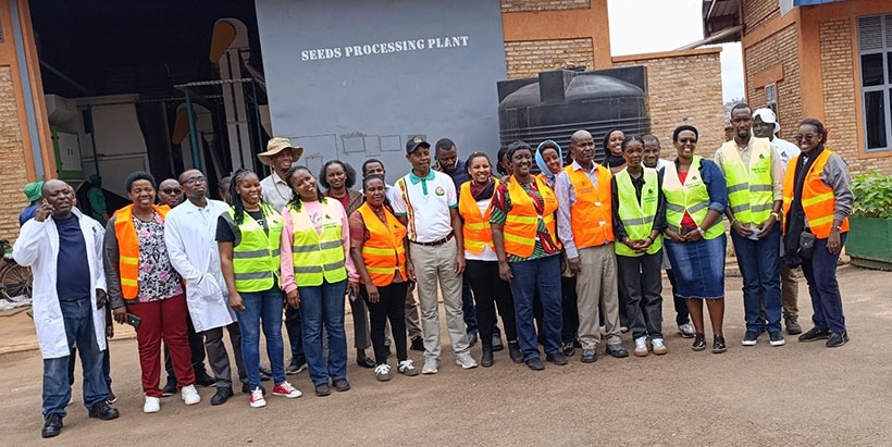The seed inspectors, along with the trainers from KEPHIS, during a visit to Rumbuka Seeds processing facility in Kamonyi District.