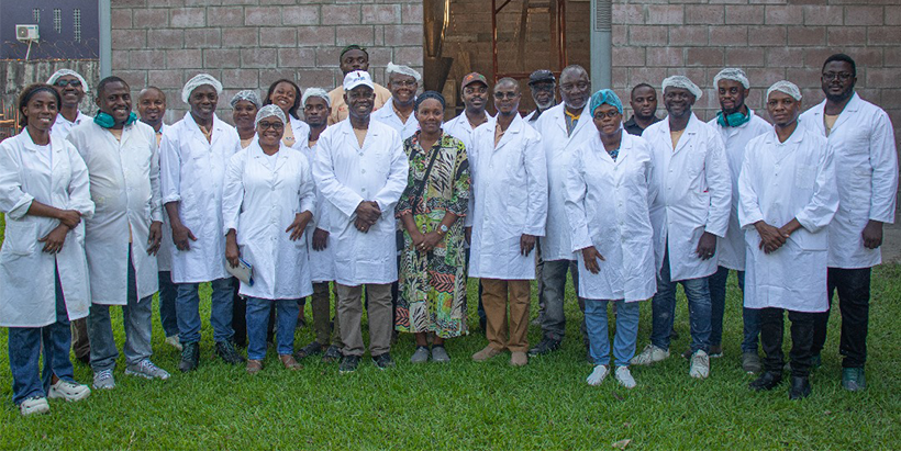 The training participants with the facilitator and company owners.