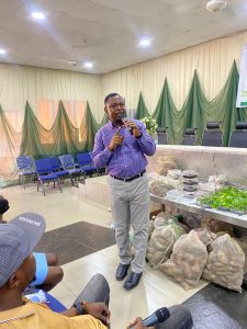 Dr Olugboyega Pelemo with the yam farmers during the training in Ondo state.