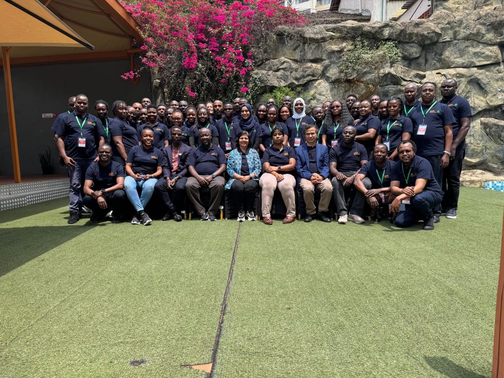 Genome editing workshop participants and facilitators pose for a group photo.
