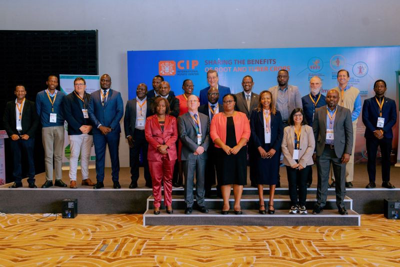 Partners pose with the State Minister of Agriculture, the Director General of RAB, the Director General of CIP, and a representative of the Gates Foundation during the launch of the BioCap Project.