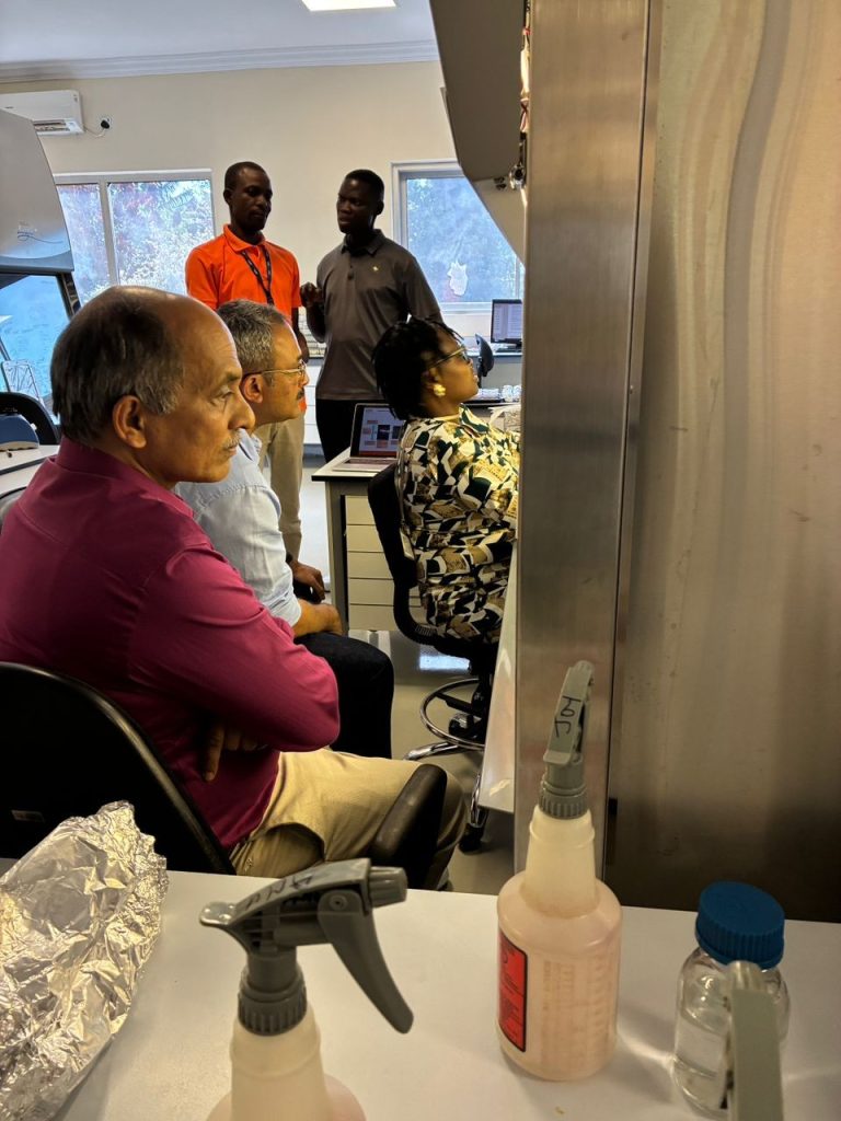 Dr Gupta and Dr Muthappa observing laboratory work at the Aflasafe Unit to characterize A. flavus strains for Aflasafe product development.