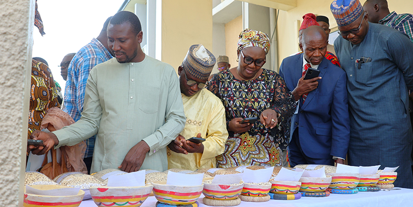 The Summit participants taking a tour of the seeds on display during an exhibition.